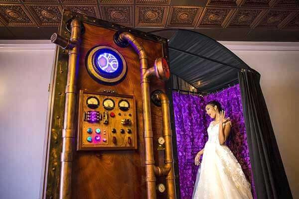 Bride beside the booth