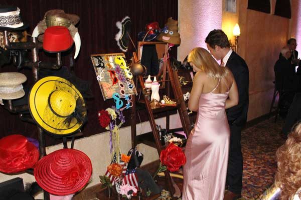 Hats, glasses and signs on the prop stand